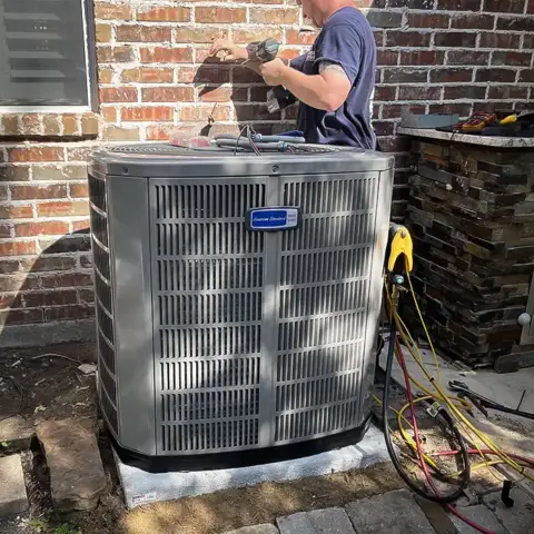 An American Heritage Air install of an American Standard air conditioning unit.